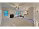 Open living room with fireplace and kitchen access at 9378 Lantana Trl, Jonesboro, GA 30238