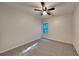 Spacious bedroom with ceiling fan and carpet flooring at 9378 Lantana Trl, Jonesboro, GA 30238