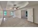 Spacious main bedroom with carpet and ceiling fan at 9378 Lantana Trl, Jonesboro, GA 30238