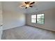 Spacious bedroom with ceiling fan and carpet flooring at 9378 Lantana Trl, Jonesboro, GA 30238