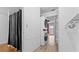 Bathroom with shower, closet, and laundry alcove at 6851 Roswell Rd # B8, Sandy Springs, GA 30328