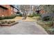 Landscaped community grounds with walkways and seating areas at 6851 Roswell Rd # B8, Sandy Springs, GA 30328