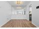 Bright dining area with hardwood floors and built-in mirror at 6851 Roswell Rd # B8, Sandy Springs, GA 30328