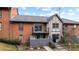 Brick townhouse exterior with private balcony and fenced patio at 6851 Roswell Rd # B8, Sandy Springs, GA 30328