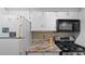 Stainless steel appliances and granite countertops in kitchen at 6851 Roswell Rd # B8, Sandy Springs, GA 30328