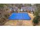 Aerial view of three well-maintained tennis courts at 6851 Roswell Rd # B8, Sandy Springs, GA 30328