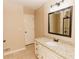 Bathroom boasts granite countertop vanity and updated shower at 7928 S Giles Rd, Douglasville, GA 30135