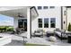 Covered patio with outdoor furniture, fire pit, and plenty of space for entertaining at 3012 Sunset Pass, Canton, GA 30114