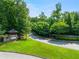 Great Sky community entrance with lush landscaping at 3012 Sunset Pass, Canton, GA 30114