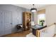 Stylish home office features wood floors, a built-in cabinet, and a window with a view at 3012 Sunset Pass, Canton, GA 30114