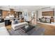 Open floorplan seamlessly connecting kitchen, living, and dining areas at 3012 Sunset Pass, Canton, GA 30114