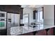 Granite countertops and stainless steel appliances in this updated kitchen at 75 Ponce De Leon Ne Ave # 403, Atlanta, GA 30308