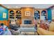 Gathering room with a stone fireplace and wood built-ins at 161 Blair Valley Ne Dr, Marietta, GA 30060
