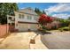 Two-car garage with attached driveway and manicured landscaping at 161 Blair Valley Ne Dr, Marietta, GA 30060