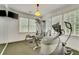 Well-equipped home gym featuring cardio and strength training equipment at 161 Blair Valley Ne Dr, Marietta, GA 30060