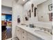 Bright bathroom with white subway tile, marble vanity, and double sinks at 161 Blair Valley Ne Dr, Marietta, GA 30060