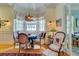 Charming dining area with built-in window seat and vintage furniture at 161 Blair Valley Ne Dr, Marietta, GA 30060