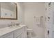 Clean bathroom with white tile, marble vanity, and shower at 161 Blair Valley Ne Dr, Marietta, GA 30060