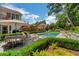 Stunning pool with flagstone patio and lush landscaping at 161 Blair Valley Ne Dr, Marietta, GA 30060