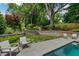 Landscaped backyard with stone walls and lush greenery at 161 Blair Valley Ne Dr, Marietta, GA 30060