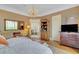 Main bedroom with a view into the bathroom, sitting area, and large windows at 161 Blair Valley Ne Dr, Marietta, GA 30060