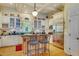 Bright kitchen features white cabinets, granite countertops, and island at 161 Blair Valley Ne Dr, Marietta, GA 30060