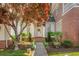 Welcoming front entry with a white door, brick walkway, and lush landscaping at 161 Blair Valley Ne Dr, Marietta, GA 30060