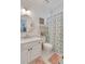 Clean bathroom with white vanity and patterned shower curtain at 161 Blair Valley Ne Dr, Marietta, GA 30060