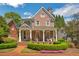Brick home with front porch and landscaped yard at 161 Blair Valley Ne Dr, Marietta, GA 30060