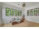 Serene bedroom with a built-in window seat and light wood floors at 161 Blair Valley Ne Dr, Marietta, GA 30060
