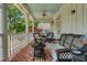 Relaxing porch with wicker furniture and a view of the yard at 161 Blair Valley Ne Dr, Marietta, GA 30060