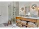 Spa-like bathroom with a large shower, double vanity, and marble floors at 161 Blair Valley Ne Dr, Marietta, GA 30060