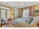 Bright bedroom with leafy green accents and French doors at 161 Blair Valley Ne Dr, Marietta, GA 30060