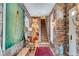 Spacious entryway with stone walls, hardwood floors, and large artwork at 161 Blair Valley Ne Dr, Marietta, GA 30060