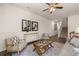 Spacious living area featuring hardwood floors and a comfortable seating arrangement at 318 Elgin Dr, Lawrenceville, GA 30045