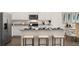 Modern kitchen island with granite countertops and seating at 318 Elgin Dr, Lawrenceville, GA 30045
