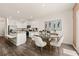 Open dining area with wood table and modern chairs at 318 Elgin Dr, Lawrenceville, GA 30045