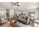 Open concept living room showcasing hardwood floors and a cozy seating area at 318 Elgin Dr, Lawrenceville, GA 30045