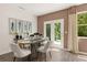 Bright dining area with wood table and access to backyard at 318 Elgin Dr, Lawrenceville, GA 30045