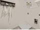 Functional laundry room with shelving and a utility sink at 318 Elgin Dr, Lawrenceville, GA 30045