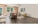 Bright living room with hardwood floors, neutral decor, and ample natural light at 318 Elgin Dr, Lawrenceville, GA 30045