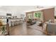 Open concept living and kitchen area with hardwood floors and island at 318 Elgin Dr, Lawrenceville, GA 30045