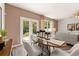 Elegant dining area with wood table and access to backyard at 318 Elgin Dr, Lawrenceville, GA 30045