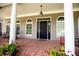 Elegant front door with a glass insert and brick flooring at 4149 Yancey Rd, Douglasville, GA 30135