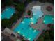 Night view of the community pool, beautifully lit at 3016 Sunset Pass, Canton, GA 30114