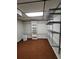 Spacious finished basement offering ample storage with shelving and closet at 4108 John Alden Ct, Stone Mountain, GA 30083