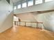 High ceiling space with hardwood floors and large windows at 1809 Silver Ridge Ct, Stone Mountain, GA 30087