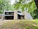 Unique stone and stucco home with wooded views at 1809 Silver Ridge Ct, Stone Mountain, GA 30087