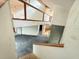 Two-story foyer with glass block wall and staircase at 1809 Silver Ridge Ct, Stone Mountain, GA 30087