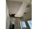 Hallway with damaged ceiling needing repair at 1809 Silver Ridge Ct, Stone Mountain, GA 30087